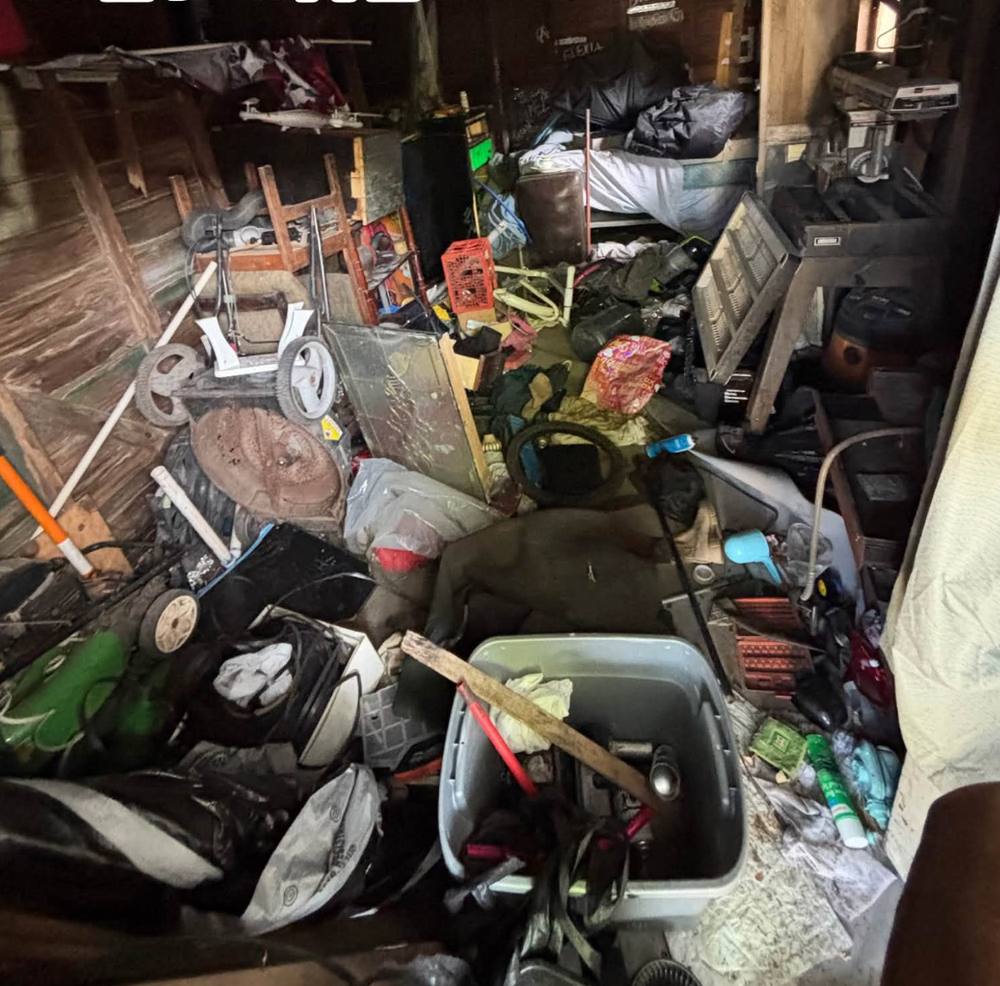 Cluttered shed full of junk before Bennington NE cleanout