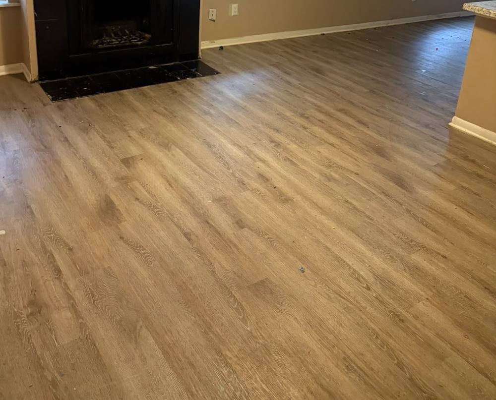 Living room floor fully cleared after junk removal service near Bennington NE