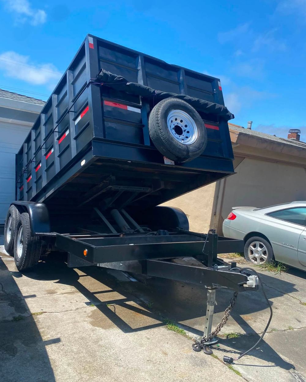 Bennington Junk Removal's dump trailer used for junk hauling and cleanouts